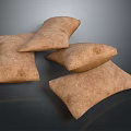 Brown Decorative Fabric Pillows Stacked On Dark Surface For Home Decor
