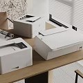 Modern White Office Printers On Wooden Desk In Workspace With Documents