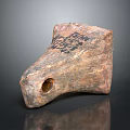 Handcrafted Stone Wood Artifact With Carved Patterns And Central Hole Structure 3d model