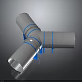 T Shaped Silver Colored Metal Pipe Fitting With Blue Rings On Black Reflective Surface
