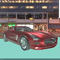 Red Mercedes Sports Car Parked On City Street With Tall Buildings And Lights