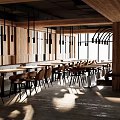 Open Concept Restaurant Featuring Wooden Walls Long Tables Brown Chairs And Sunlight Through Arched Windows