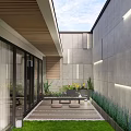 Modern Courtyard Garden With Stone Pathway Greenery Lawn And Lighting Features