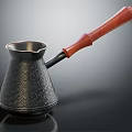 Stylish Metallic Coffee Pot With Wooden Handle And Patterned Surface For Kitchen Use