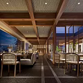 Spacious Restaurant Interior Design With Wooden Ceiling Large Windows Tables Chairs Green Plants And Lighting