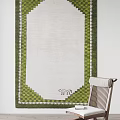 Elegant Square Rug With White Center Green Checkerboard Border And Decorative Logo