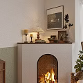 Cozy Arched Burning Fireplace With Candles Lamp Framed Pictures And Plant