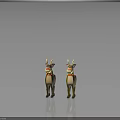 Two Brown And Light Brown Reindeer Toys With Red Noses Red Collars And Yellow Ornaments
