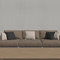Modern Three Seater Cream Sofa with Striped and Plain Cushions in Light Brown Room Setting