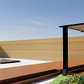 Courtyard Garden With Wooden Fence Outdoor Dining Table And Green Lawn