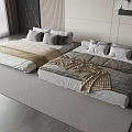 Modern Bedroom Interior With Double Beds Yellow Brown Quilts And Gray Pillows