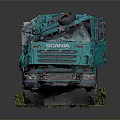 Teal Colored Dump Truck With Open Bed Metal Parts And Grass Surroundings