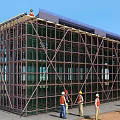 Busy Construction Site with Scaffolding Glass Facade Workers Wearing Safety Helmets and Crane