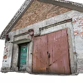 Old Industrial Factory Buildings Featuring Gray Roofs Red Brick Walls Red Doors And Peeling Paint