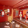Cultural Exhibition Display With Red Walls And Featured Images With Text