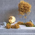 Garden Ornament Scene Featuring Golden Trees Glowing Sphere Small Stones And Green Grass