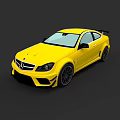 Yellow Mercedes Two Door Sports Car With Rear Spoiler And Black Wheels