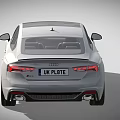 White Audi Sports Car With UK Plate Black Roof And Orange Wheels