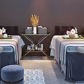 Luxury Massage Beds In Elegant Spa Room With Stools Flower Vases And Coat Hanger