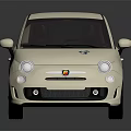 Stylish Cream Compact Car With Black Roof Round Headlights Blue Stripe And Silver Alloy Wheels