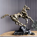 Abstract Golden Horse Sculpture Dynamic Leaping Pose With Black Stone Base And Green Plant Decor