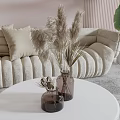 Modern Beige Sofa And Round Coffee Table Set With Dried Flowers And Large Green Plant