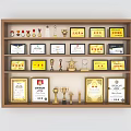 Trophies and Medals Display on Wooden Shelf with Certificates Red Banners