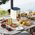 Modern Dining Table Set With Assorted Dishes Air Fryer And Scenic Outdoor View