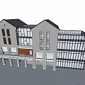 Traditional And Modern Commercial Complex With Grey Facade Glass Curtain Wall And Retail Storefronts