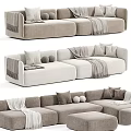 Modern Minimalist Sectional Sofa In Neutral Tones With Decorative Pillows Throw Blankets And Ottomans