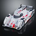 Audi White Race Car With Red Accents And Aerodynamic Design Features