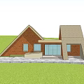 Modern Red Brick House Exterior With Triangular Roof Windows Stone Path Lawn Steps Bench