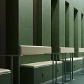 Modern Cafe Interior With Green Walls Vertical Columns White Bench Seats And Metal Tables