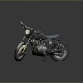 Black Vintage Motorcycle With Knobby Tires Textured Seat And Exposed Engine