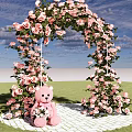 Floral Art Decoration Featuring Pink Roses Arch Green Vines And Teddy Bear On White Brick