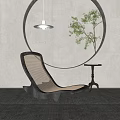 Modern Lounge Chair With Circular Wall Decoration Pendant Light Green Plant And Textured Rug