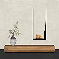 Modern Style Fireplace With Yellow Flames Gray Wall Wooden Cabinet White Vase And Green Plant