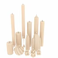 Textured White Candles in Various Shapes and Heights with Lit Wicks