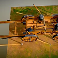 Ancient Wooden Chariot With Large Spoked Wheels Metal Containers And Spears