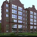Modern Multi Story Red Brick Residential Building Featuring Large Windows And Greenery Surrounding