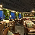 Cozy Café Interior Design With Comfortable Seating Hanging Lights And Green Plants