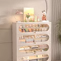 White Storage Cabinet With Transparent Compartments Organizing Cosmetics And Decorative Items