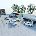 Various Cars Including Bus And Tanker Truck Parked In Open Area With Trees And Building