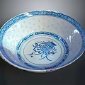 Intricate Carved Ceramic Bowl With Blue And White Floral Patterns Design
