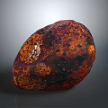 Natural Wooden Stone Material with Red Brown Surface Black Spots and Glossy Rounded Shape