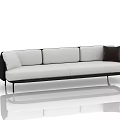 Modern Three Seater Sofa with White Upholstery Black Accents and Sleek Metal Legs