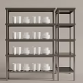 Dark Metal Display Shelves With Neatly Arranged White Mugs And Plates