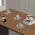 Coffee Cups On White Saucers Over Wooden Table With Stack Of Books And Geometric Art