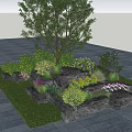 Garden Ornament With Stone Flower Beds Various Plants Tree Grass And Paved Ground