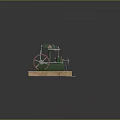 Mechanical Model of Spacecraft Propulsion Mechanism With Green Body Red Wheel and Wooden Base